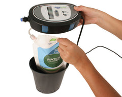 Photo of Automatic Dosing System Pond Water Treatments  - Aquascape USA