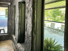 Slate Panel covering Interior wall of building doorway 
